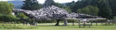 At 122 feet long and about 25 feet high, Vermontasaurus is substantially larger than most real dinosaurs. Its “backbone” is a roof truss salvaged from a building collapsed by heavy snow. Also included in its bulk are window frames, broken furniture, an old toboggan, a smashed acoustic guitar, and at least three nests built by local birds.