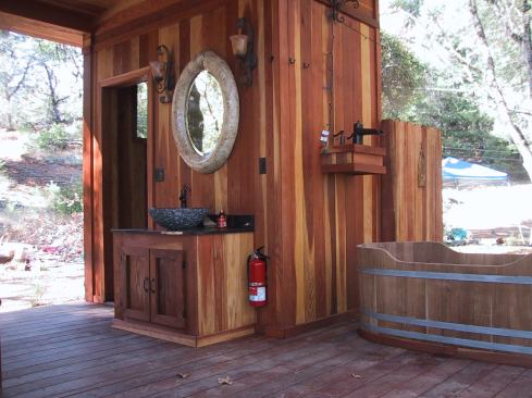 The teak bathtub (lower right) was imported from Thailand.