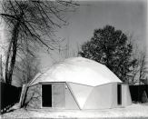 Built at a cost of less than $8,000, the 37-foot dome seemingly lived up to the manufacturer’s claim that it “provided maximum space at minimum cost, in a revolutionary ratio.” Unfortunately for its inhabitants, it also leaked.