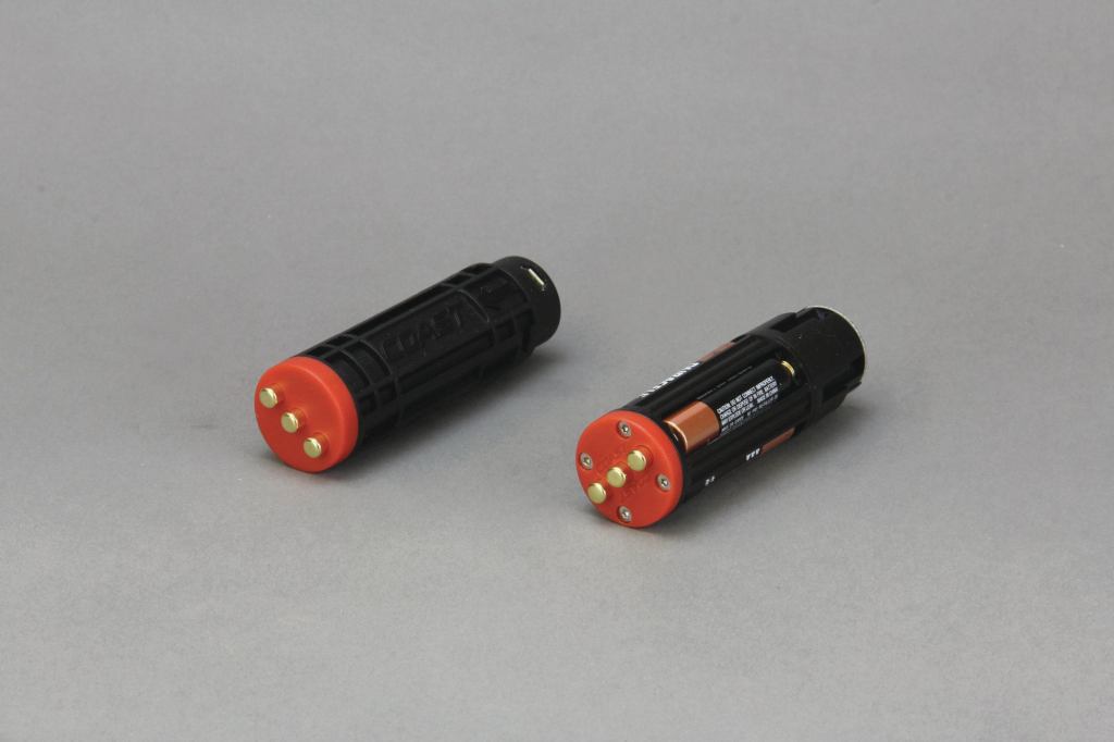Power options include a rechargeable lithium-ion battery pack and an adapter pack containing four AAA batteries.
