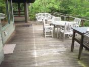 Located in the heart of Vermont’s Green Mountains, this slope-side ipe deck hadn’t been maintained since its installation 14 years ago. Note the drip line underneath the eaves.