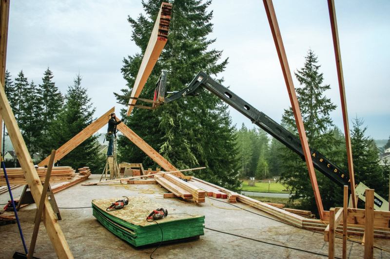 When a beam is lifted with a forklift, care must be taken to ensure the beam can’t tip forward. The worker guiding the beam into place must stand out of the way to avoid a “dead fall,” and at the very least, the forks should be tipped back toward the cage.