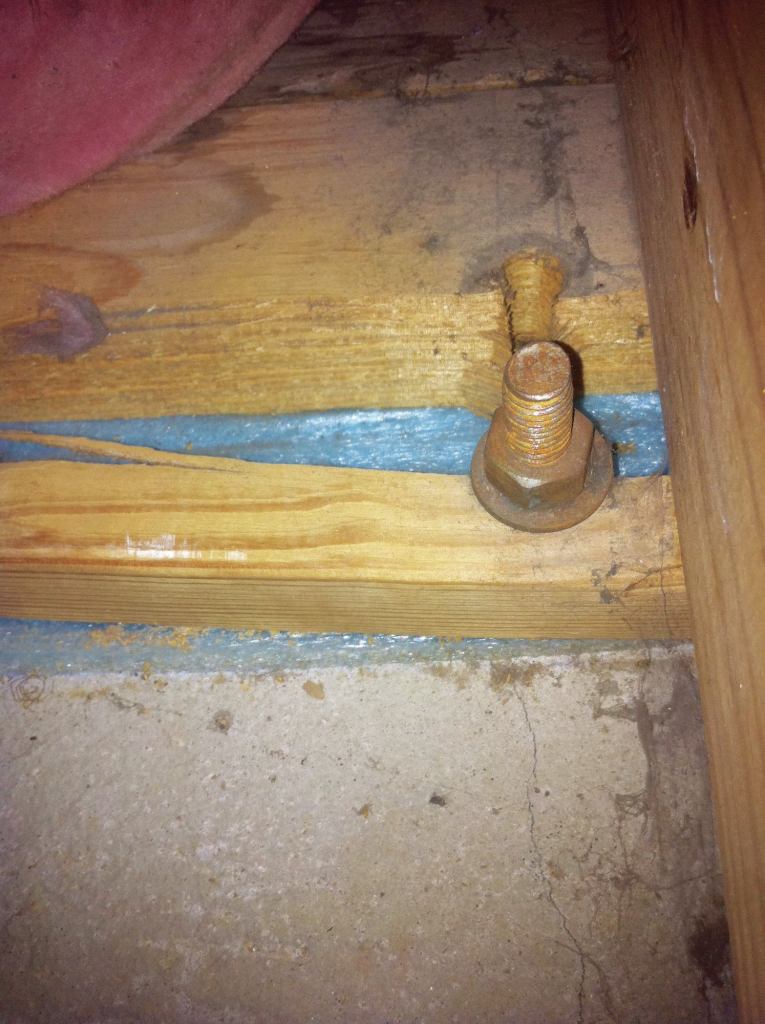 Inspect a sill plate carefully for structural issues before fastening a lateral-load anchor to it.