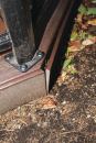 Though installed following the manufacturer’s recommendations, the composite fascia trim on this deck is pulling away from the framing in several locations, including this mitered corner.