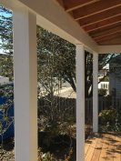 The PVC wraps for these porch posts came from folding kits made in the shop.