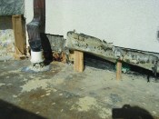 Doug Horgan's photo from “Repairing a Stone Patio Over a Living Space” (Jul/16) shows aluminum flashing that has deteriorated after being in contact with a concrete surface.