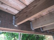 Even though this Belmont Hills, Calif., deck was built in 1995, the joist hangers and fasteners are still in good shape, with little evidence of corrosion. This deck was framed with CCA-treated lumber.