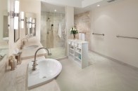 This bathroom by Glickman Design Build, which won a 2015 Chrysalis National Residential Universal Design Award, features accessible features such as grab bars, lever faucets, and a zero-threshold entry to the double shower.