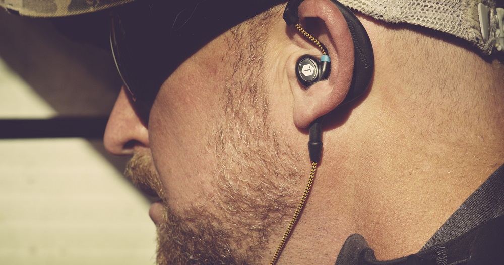 ToughTested Jobsite noise control earbuds come with a mic and have a certified Noise Reduction Rating (NRR) of 23db. They are also IP64 certified for water/sweat/dust resistance.