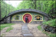 Above is the Hobbit home’s front facade. Built to Passive House standards, the home’s features include low air infiltration; super-insulated walls, roof, and floor; high-performance windows and exterior doors; energy recovery ventilation; and ADA accessibility (inside and out).