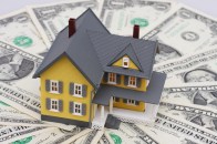 home surrounded by money