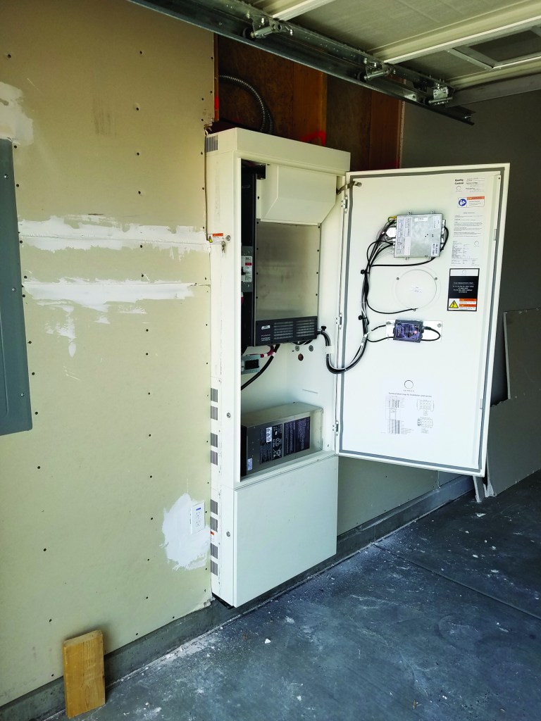 The secret is in the home’s Sonnen battery compartment; here, power stored up on sunny mornings will supply the house all afternoon.