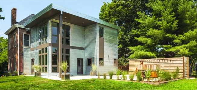 A marriage of old and new. On the exterior, the architect specified corrugated galvanized metal panels for a modern addition on the original 1840s home—a detail that the author adapted for the interior shower walls.