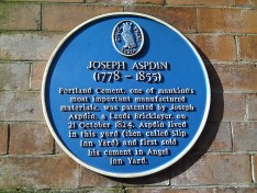 A plaque in Leeds, England, proclaims Joseph Aspdin as the father of Portland cement.