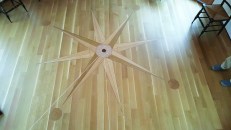 The compass rose is the focal point of an eight-sided room.