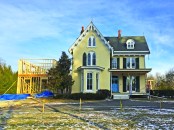 The author rebuilt the Gothic-style porch as part of a major addition and exterior restoration project.