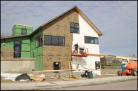 The library was built to be highly durable with 2x8-framed walls sheathed with 1/2-inch OSB and 2-inch Zip System R-Sheathing (with dense-pack cellulose). Wide windows reduced the number of long grade-to-soffit runs of vertical siding.