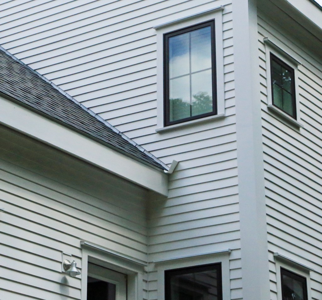 A properly installed kickout diverts roof water away from siding at a roof-to-wall  intersection. (Photo by Mike Guertin.)