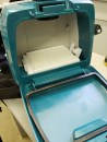 The unit ships with disposable dust bag and HEPA filter. Reusable dust bags are available.