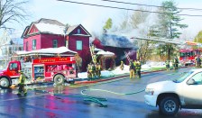 The fire started in an attached carriage barn.