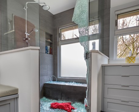 Tempered glass shower door spontaneously exploded scattering glass all over the bathroom
