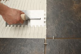 Hand holding a trowel