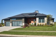 Modern ranch house plan, front exterior. See details at Houseplans.com.