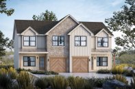Duplex house plan, front exterior. See details at Houseplans.com.