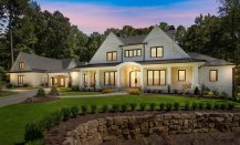 Luxury farmhouse plan from Visbeen Architects, front exterior. See details at Houseplans. Photo by Desmond Jones, courtesy of Visbeen Architects.