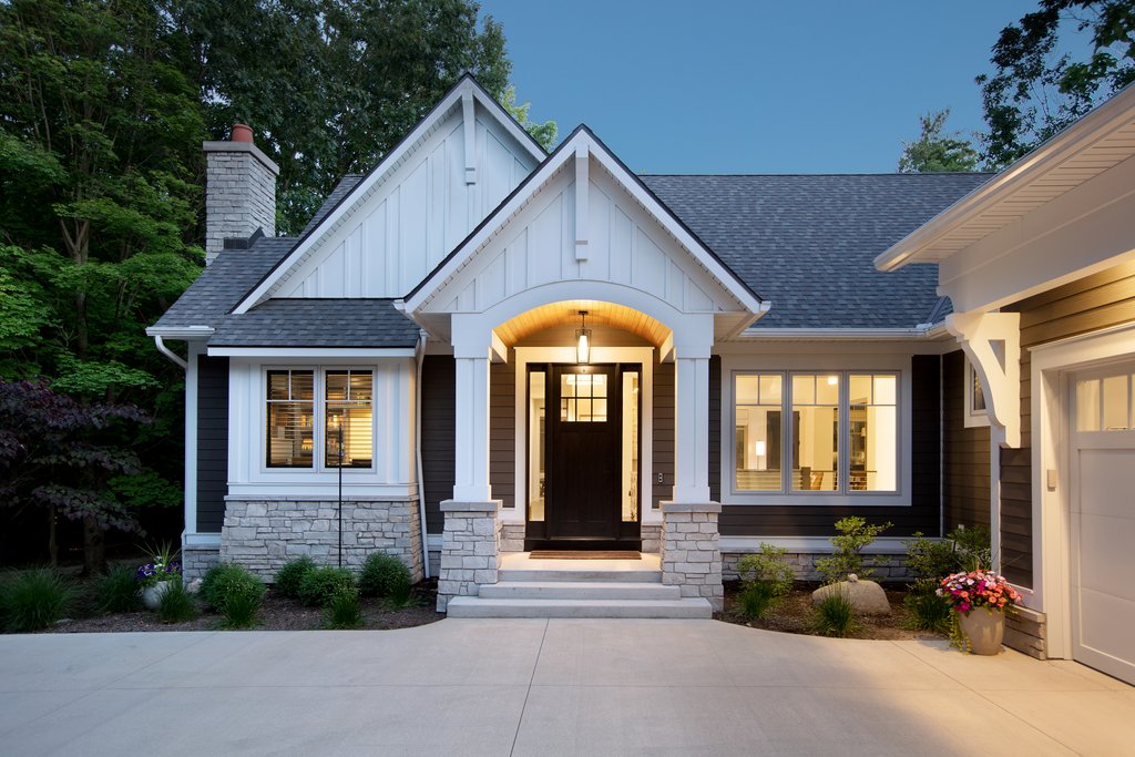 Craftsman house plan with basement, front exterior photo. Photo by Mike Buck, courtesy of Visbeen Architects. See more photos at Houseplans.