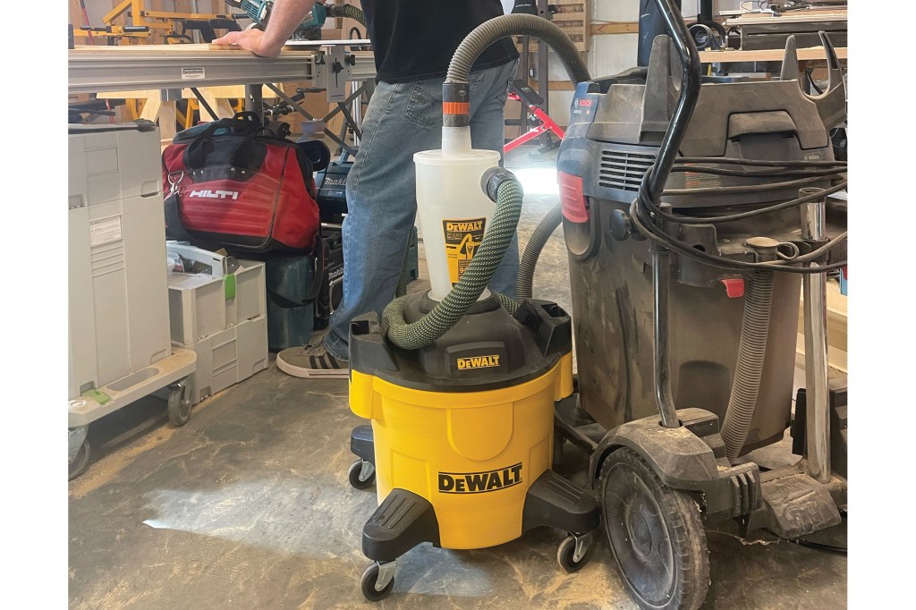 The DeWalt DXVCS002 dust cyclone separator has a stable base with casters.