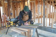 When you’re installing blocking, it’s more efficient to measure, mark, and cut all the pieces to length at once than handle them one at a time. Instead of trying to remember the lengths you need, write them down on one of the pieces.
