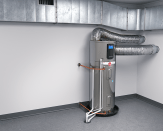 A heat pump water heater can be installed with a duct kit. Most water heater manufacturers allow just the inlet duct (if the water heater is in a small space and additional airflow is needed), or just outlet duct (to direct the cold air exhausted by the unit to the outside), or both. (Photo courtesy Rheem Manufacturing)