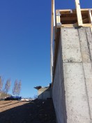 Measure twice, pour once. Solutions for a mis-poured foundation will vary, but the sooner the mistake is identified, the greater the range of options will be to fix it.