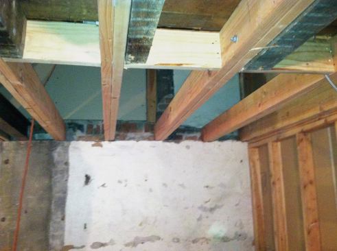 ... then installed solid 2x6 blocking to help stiffen the floor.