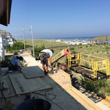 As with a standard water-proof deck, T&G subfloor is gluied and nailed to the tops of the joists.