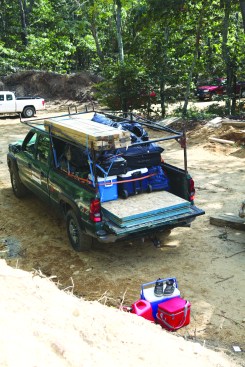 The crew’s truck is packed up and ready to return home with the shrink-wrap material, extra lumber, food coolers, and luggage. No dumpster was needed, and no trash pile was left on site.