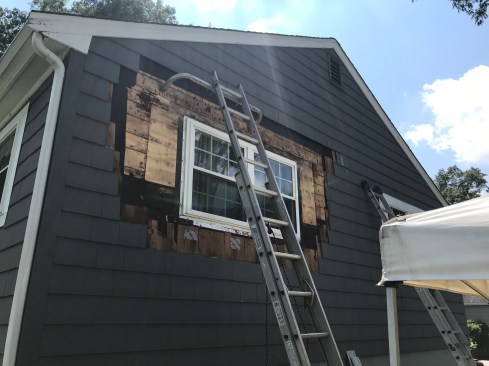 Before repairs could proceed, the author peeled back the siding.There was evidence that a narrower but taller window had been installed. The WRB around the new window had not been properly integrated with the original tar paper. He also found many places where the siding had not been stepped back at the proper offset of at least 1 1/2 inches. 