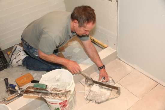 A score-and-snap tile cutter works well for cutting many large-format
glass tiles.