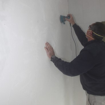Sand down any high spots before proceeding with the installation.