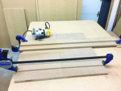 For shorter dadoes, he made an MDF guide, clamping the sides of the box together to make the dadoes identical.