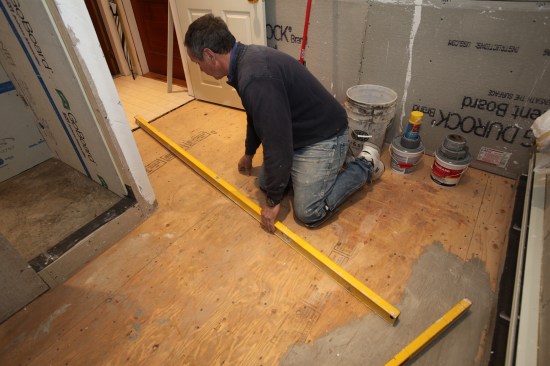 Working toward the door, the floor dropped nearly 3/4 inch.