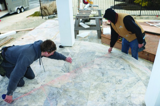 Snap a chalk line from the centerline along the triangle leg that is perpendicular to the chord. The process is repeated on the other chord, and the intersecting point of the two snapped lines is the center, or pivot, point of the circle.