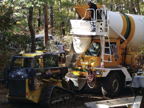 Because of its consistency, pervious concrete cannot be pumped; in fact, it’s so thick that you need to use a short concrete chute to discharge the mix.