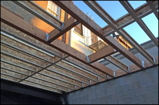 The roof framing was flushed-framed similarly to the addition’s parlor-level floor, but with TJIs and an LVL box-out for a skylight. 