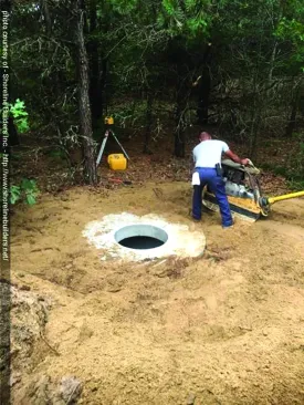After running the water lines and power supply to the well pit, the excavator backfilled and compacted the soil around the pit.