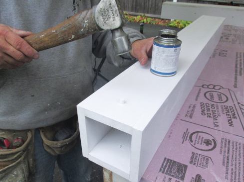 A dab of PVC adhesive helps to hold the plug in place.