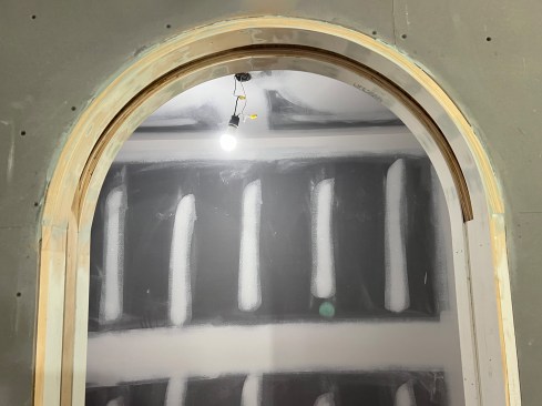 Wood filler was applied the extension jamb assembly and later sanded.