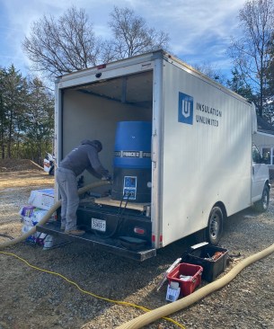 TimberFill comes tightly packed and requires a bit of pre-conditioning when being loaded into an insulation machine. The author notes "Once the material’s flowing, things get good. We appreciate how pure it is—there’s nothing but consistently sized wood fiber in the bag."