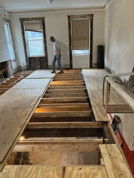 The architect called for adding mass-loaded vinyl (MLV) to the floor assembly as well as to the party wall 